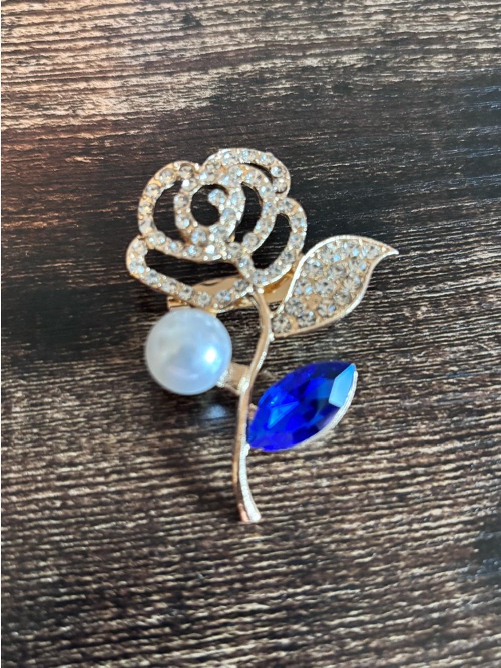 Gold-Tone Rose Brooch with White Pearl and Sapphire Blue Crystal - Picture 1 of 3